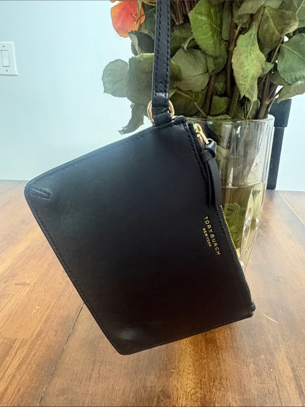 Tory Burch Black Leather Wristlet with Gold Logo. Like new no callouts
